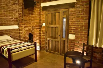 Cama o camas de una habitación en Hotel Casa Cantera