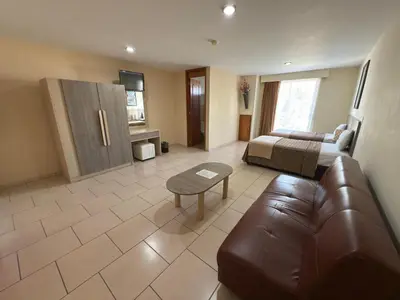 Zona de estar de Hotel Ciprés Puebla