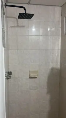 Un baño de Hotel Sharidia Inn