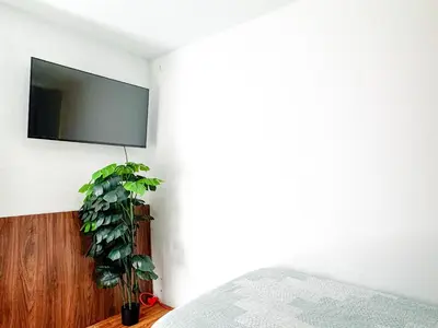 Una televisión o centro de entretenimiento en Casa Boutique Sabu