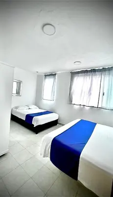 Cama o camas de una habitación en Tequesquitengo Finca Flor de Loto