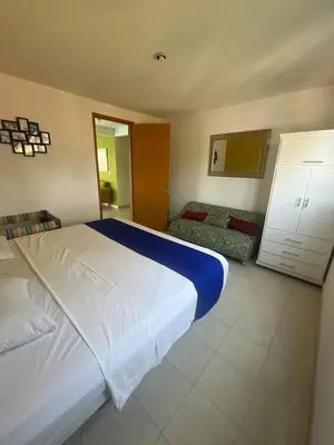 Cama o camas de una habitación en Tequesquitengo Finca Flor de Loto
