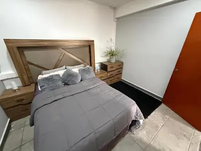 Cama o camas de una habitación en Suites vergel balcón