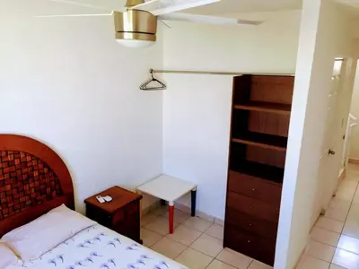 Cama o camas de una habitación en Villa amplia y cómoda