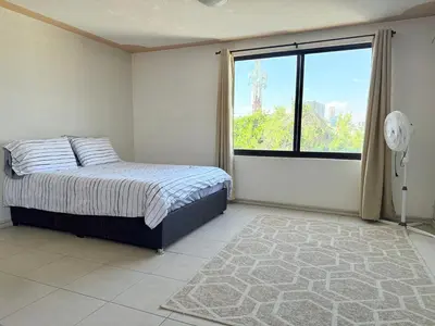 Cama o camas de una habitación en Departamento enteró en Mayorazgo