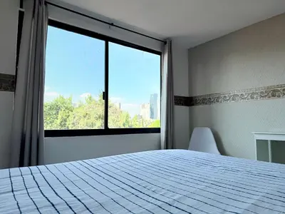 Cama o camas de una habitación en Departamento enteró en Mayorazgo