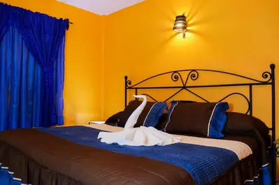 Cama o camas de una habitación en Hotel Cristal Chignahuapan