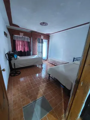 Cama o camas de una habitación en Terrazas Hotel and Hostel