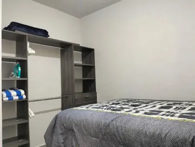 Cama o camas de una habitación en Departamento de descanso