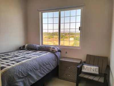 Cama o camas de una habitación en Departamento de descanso