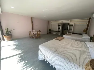 Cama o camas de una habitación en Cabañas y Restaurante La Luna