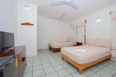Cama o camas de una habitación en Hotel Del Profe, Huatulco