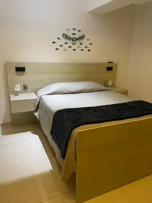 Cama o camas de una habitación en Acapulco Diamante Departmento Exclusivo