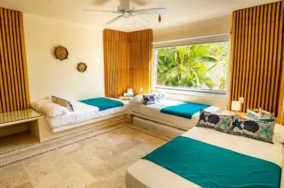 Cama o camas de una habitación en Casa Wapa Espectacular Villa Boho Chic en Acapulco