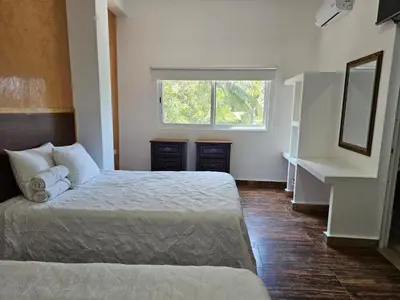 Cama o camas de una habitación en Hotel Familiar Abejac