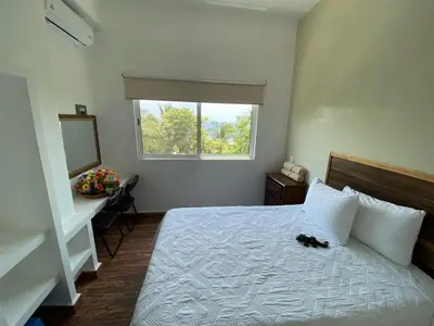 Cama o camas de una habitación en Hotel Familiar Abejac
