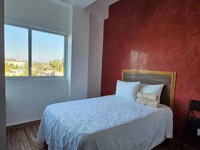 Cama o camas de una habitación en Hotel Familiar Abejac