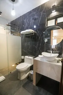 Un baño de Mandarina's House Hotel