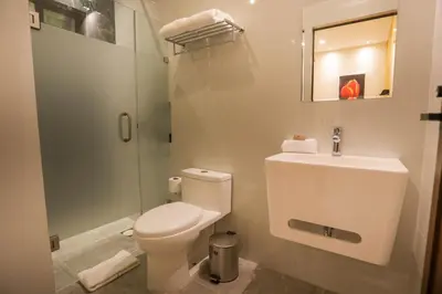 Un baño de Mandarina's House Hotel