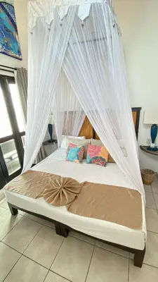 Cama o camas de una habitación en Hotel Budamar Zipolite