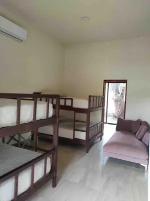 Cama o camas de una habitación en Villa Tulipan las estacas morelos