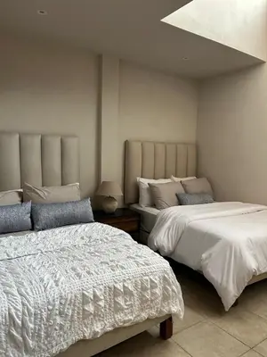 Cama o camas de una habitación en Encanto Taxqueño