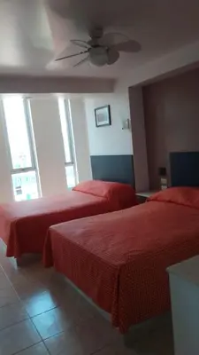 Cama o camas de una habitación en departamento en riviera veracruzana