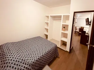 Cama o camas de una habitación en Ideal Depa Playa y Plazas Cerca