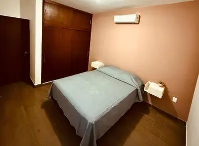 Cama o camas de una habitación en Ideal Depa Playa y Plazas Cerca