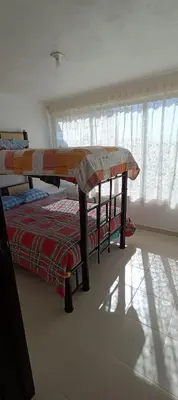 Cama o camas de una habitación en Hospedaje gardenias