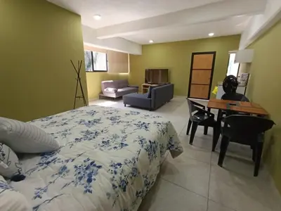 Zona de estar de El Árbol Plaza Suites - Terra
