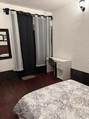 Cama o camas de una habitación en Hacienda bosque