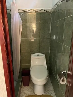 Un baño de Hotel Las Flores