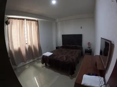 Cama o camas de una habitación en Departamento Diamante
