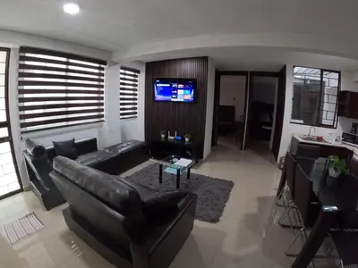 Una televisión o centro de entretenimiento en Departamento Diamante
