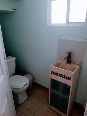 Un baño de Casa Paz, amplia y cómoda frente a la alberca