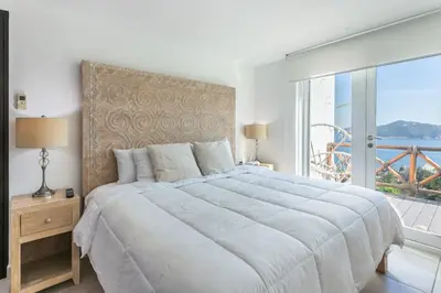 Cama o camas de una habitación en Bello departamento con vistas al mar