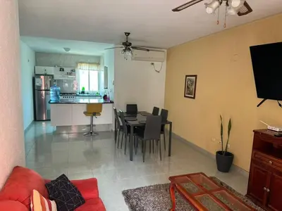 Una televisión o centro de entretenimiento en Departamento céntrico en Boca del Rio con alberca