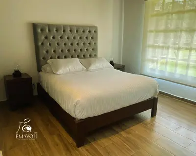 Cama o camas de una habitación en Cabañas EMAYOLI