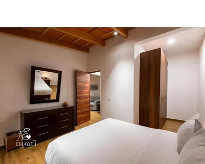 Cama o camas de una habitación en Cabañas EMAYOLI