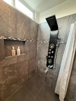Un baño de Suites vergel planta baja