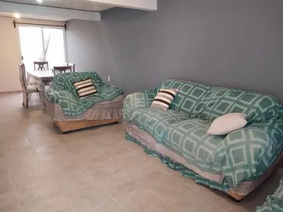Zona de estar de Family Cutting House