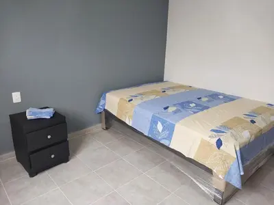 Cama o camas de una habitación en Family Cutting House