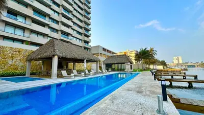 Piscina en o cerca de Lujoso Penthouse con alberca vista increíble al Mar y Rio en el Estero