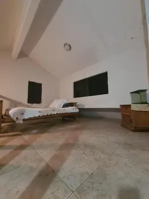Una televisión o centro de entretenimiento en Beach chalet with Private Pool