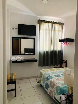 Cama o camas de una habitación en Hotel Pink TH