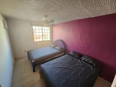 Cama o camas de una habitación en Colors Acapulco