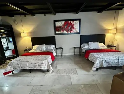 Cama o camas de una habitación en The Rooftop TerraceA unique view, downtown and comforta