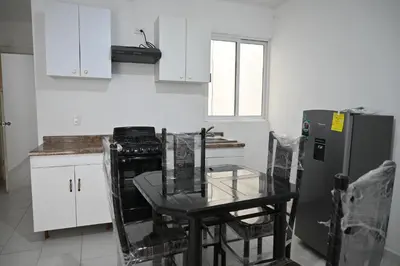 Una cocina o zona de cocina en Departamentos La Soledad