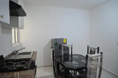 Una cocina o zona de cocina en Departamentos La Soledad